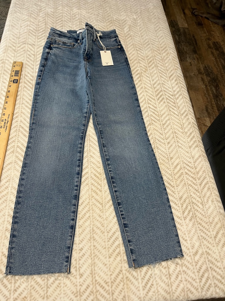 Good American Light Blue Denim Jeans With Raw Hem Detail 0/25